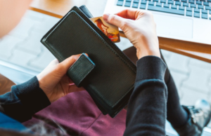 pulling out a credit card