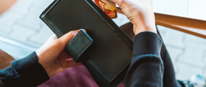 pulling out a credit card